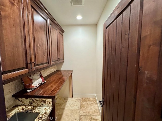 1415 Via Vallarta, Riverside, CA 92506 - laundry room with baseboards and recessed lighting