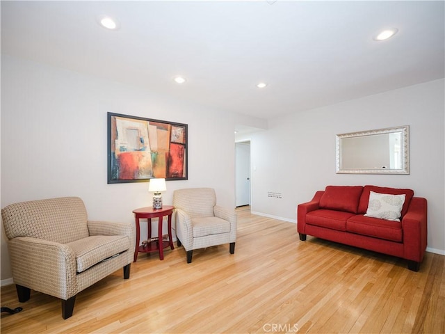 10022 Gothic Ave, North Hills, CA 91343 - living area featuring light wood finished floors, baseboards, and recessed lighting
