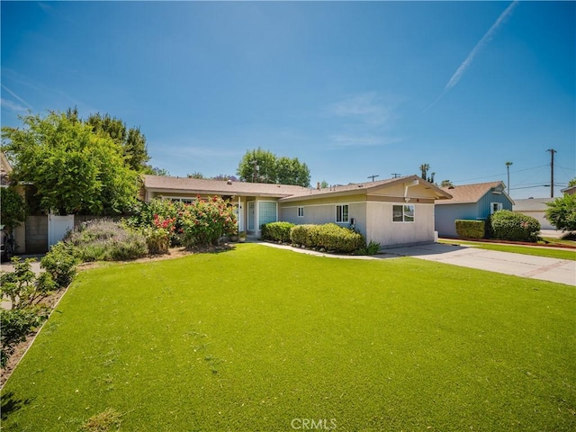 10022 Gothic Ave, North Hills, CA 91343 - ranch-style house featuring a front lawn and concrete driveway