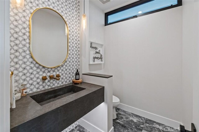 1010 Kings Rd, Newport Beach, CA 92663 - bathroom featuring marble finish flooring, wallpapered walls, toilet, baseboards, and vanity