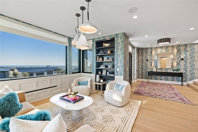 1010 Kings Rd, Newport Beach, CA 92663 - living room featuring wallpapered walls, wood finished floors, recessed lighting, and plenty of natural light
