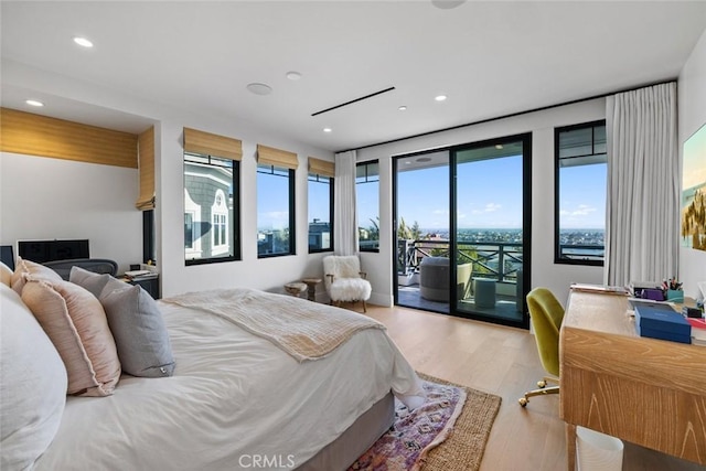 1010 Kings Rd, Newport Beach, CA 92663 - bedroom with access to exterior, wood finished floors, and recessed lighting
