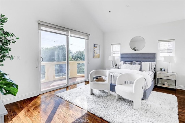 602 N Juanita Ave Unit A, Redondo Beach, CA 90277 - bedroom with access to exterior, vaulted ceiling, dark wood finished floors, and baseboards
