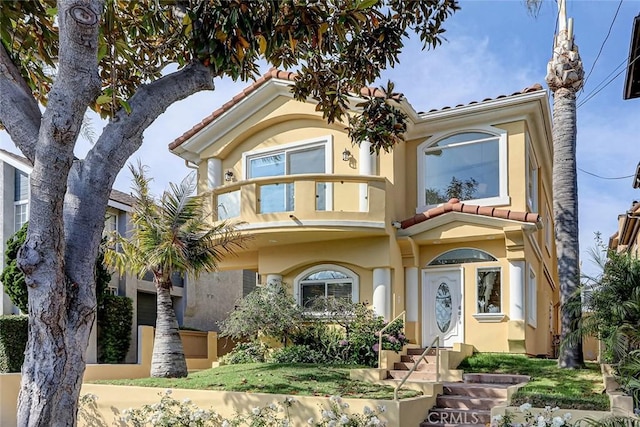 602 N Juanita Ave Unit A, Redondo Beach, CA 90277 - view of front of house with a tiled roof and stucco siding