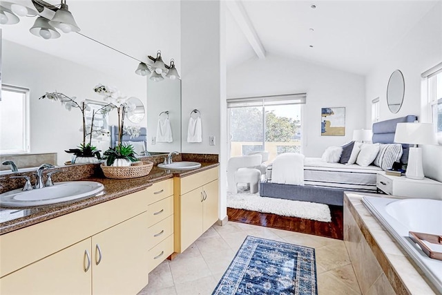 602 N Juanita Ave Unit A, Redondo Beach, CA 90277 - bathroom with double vanity, a garden tub, tile patterned floors, and a chandelier