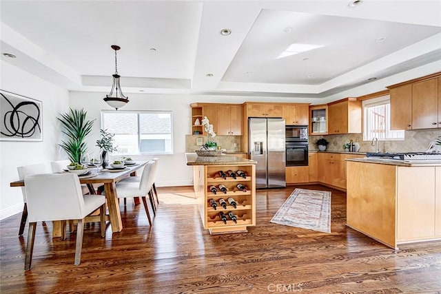 602 N Juanita Ave Unit A, Redondo Beach, CA 90277 - kitchen featuring stainless steel fridge, open shelves, a tray ceiling, backsplash, and dark wood finished floors