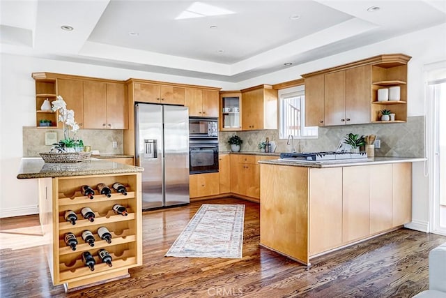 602 N Juanita Ave Unit A, Redondo Beach, CA 90277 - kitchen with open shelves, stainless steel fridge with ice dispenser, a raised ceiling, a peninsula, and black microwave