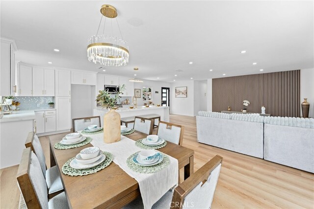 5080 Pinto Pl, Norco, CA 92860 - dining area with recessed lighting, light wood-style flooring, and a chandelier