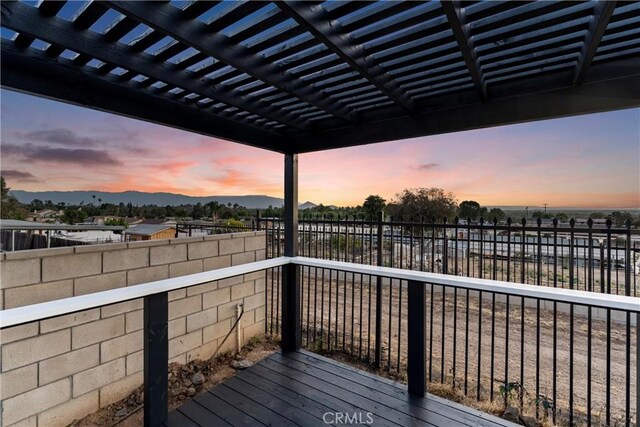 5080 Pinto Pl, Norco, CA 92860 - deck at dusk with a pergola and a mountain view