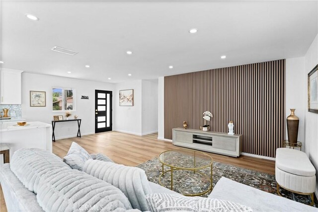 5080 Pinto Pl, Norco, CA 92860 - living room featuring light wood-type flooring, recessed lighting, baseboards, and an accent wall