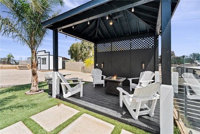 5080 Pinto Pl, Norco, CA 92860 - deck with a gazebo, a fire pit, an outbuilding, and a patio area