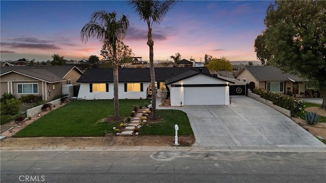 5080 Pinto Pl, Norco, CA 92860 - ranch-style home with a garage, a front yard, concrete driveway, a residential view, and stucco siding