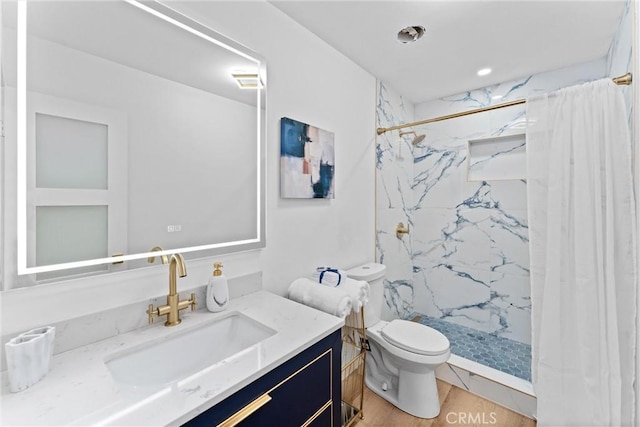 5080 Pinto Pl, Norco, CA 92860 - bathroom featuring toilet, vanity, and a marble finish shower