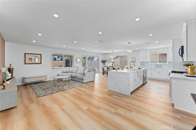 5080 Pinto Pl, Norco, CA 92860 - living area with recessed lighting and light wood-style floors
