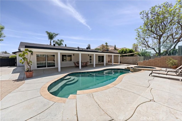 5080 Pinto Pl, Norco, CA 92860 - view of swimming pool with a fenced backyard, a patio area, and a pool with connected hot tub