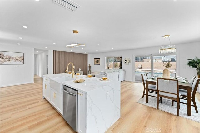 5080 Pinto Pl, Norco, CA 92860 - kitchen featuring dishwasher, a chandelier, a sink, white cabinets, and light wood-type flooring