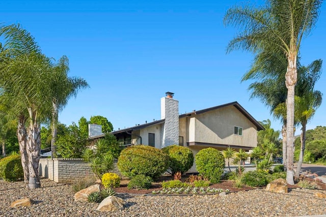 3404 Oak Cliff Dr Unit 8, Fallbrook, CA 92028 - view of property exterior with stucco siding and a chimney