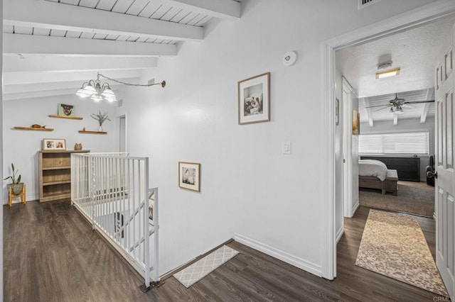 3404 Oak Cliff Dr Unit 8, Fallbrook, CA 92028 - corridor featuring beam ceiling, baseboards, wood finished floors, an upstairs landing, and a chandelier