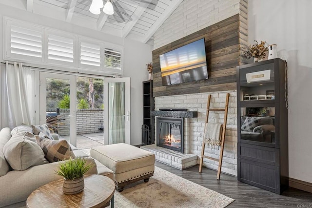 3404 Oak Cliff Dr Unit 8, Fallbrook, CA 92028 - living area featuring high vaulted ceiling, a large fireplace, wood finished floors, and wood ceiling with exposed beams