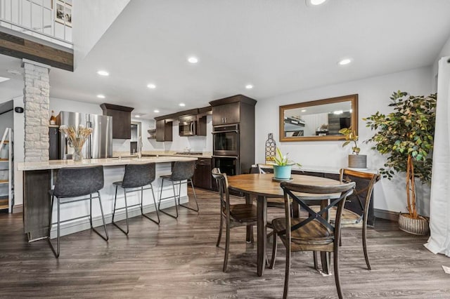 3404 Oak Cliff Dr Unit 8, Fallbrook, CA 92028 - dining area featuring dark wood-type flooring, recessed lighting, decorative columns, and baseboards
