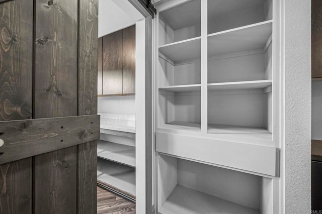 3404 Oak Cliff Dr Unit 8, Fallbrook, CA 92028 - spacious closet featuring wood finished floors