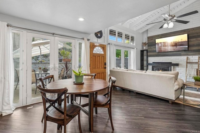 3404 Oak Cliff Dr Unit 8, Fallbrook, CA 92028 - dining room with french doors, wood finished floors, wood walls, a fireplace, and recessed lighting