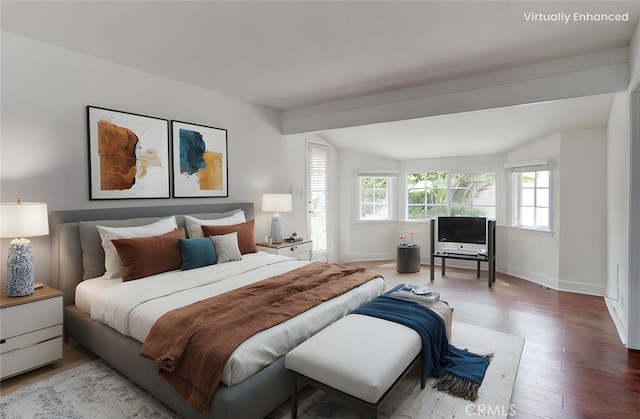 9341 Grand Dr, Huntington Beach, CA 92646 - bedroom featuring wood finished floors and baseboards