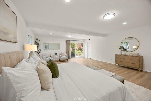 915 W Solano St, Upland, CA 91784 - bedroom featuring wood finished floors, recessed lighting, and access to exterior