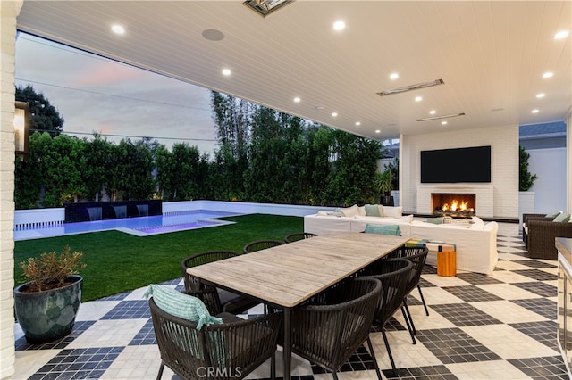 1110 Kings Rd, Newport Beach, CA 92663 - view of patio / terrace with an outdoor living space with a fireplace, outdoor dining space, and an outdoor pool