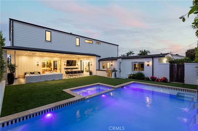 1110 Kings Rd, Newport Beach, CA 92663 - rear view of property featuring outdoor lounge area, area for grilling, a patio area, and a pool with connected hot tub