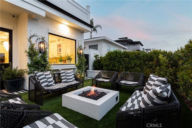 1110 Kings Rd, Newport Beach, CA 92663 - view of patio featuring an outdoor fire pit