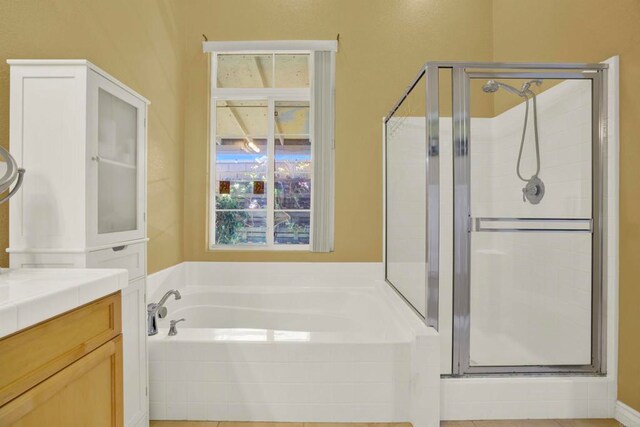 907 Rockwell Springs Ct, Escondido, CA 92025 - bathroom featuring a shower stall, a garden tub, and vanity