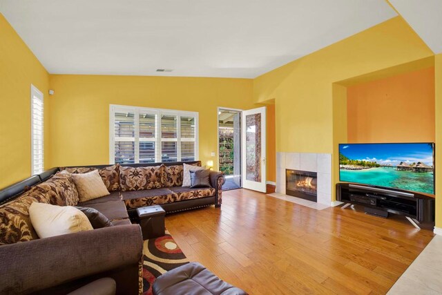 907 Rockwell Springs Ct, Escondido, CA 92025 - living room featuring wood finished floors, a fireplace, and baseboards