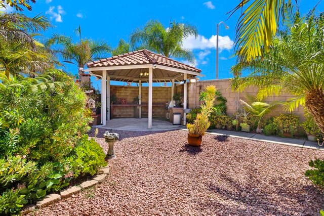 907 Rockwell Springs Ct, Escondido, CA 92025 - fenced backyard with a gazebo and a patio