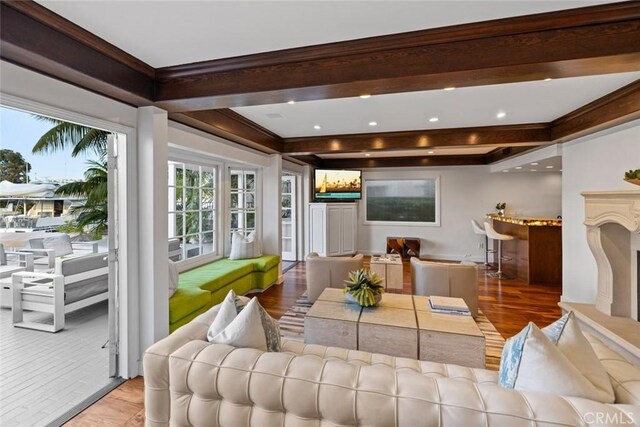 218 Evening Star Ln, Newport Beach, CA 92660 - living area featuring crown molding, beam ceiling, recessed lighting, and wood finished floors