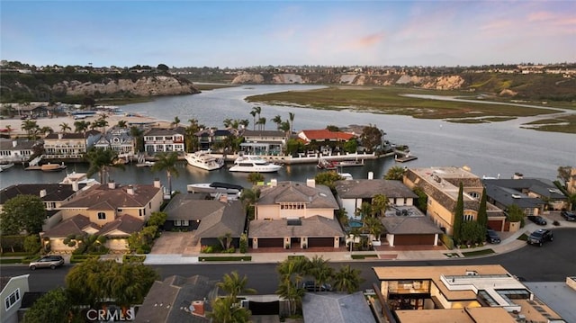 218 Evening Star Ln, Newport Beach, CA 92660 - aerial perspective of suburban area with a nearby body of water