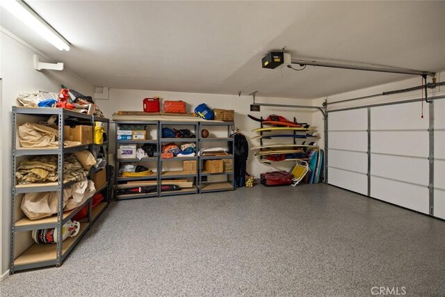218 Evening Star Ln, Newport Beach, CA 92660 - garage featuring a garage door opener