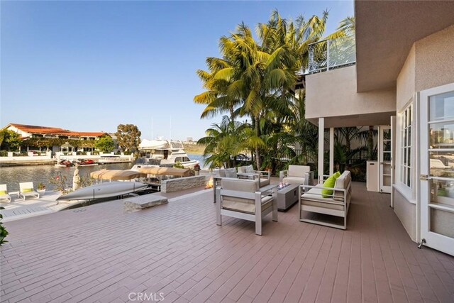 218 Evening Star Ln, Newport Beach, CA 92660 - view of patio / terrace featuring an outdoor living space and a water view