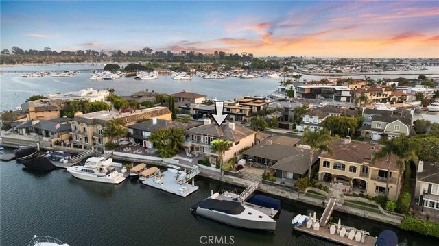 218 Evening Star Ln, Newport Beach, CA 92660 - aerial perspective of suburban area with a large body of water