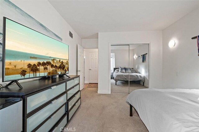 218 Evening Star Ln, Newport Beach, CA 92660 - bedroom featuring light carpet, a closet, and baseboards