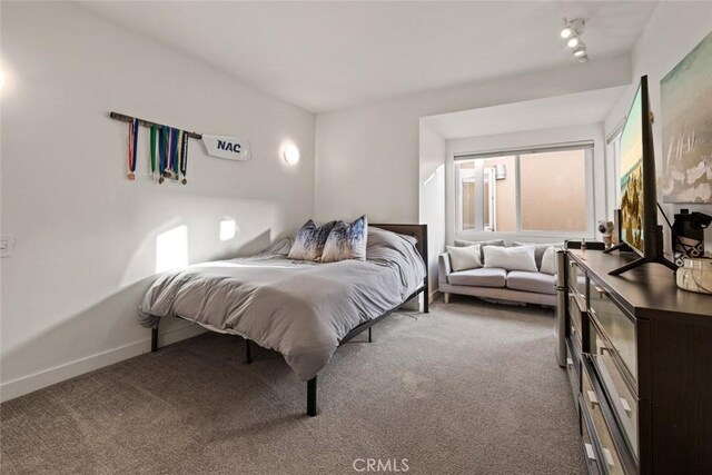 218 Evening Star Ln, Newport Beach, CA 92660 - carpeted bedroom featuring baseboards