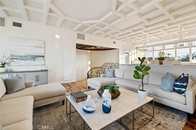 218 Evening Star Ln, Newport Beach, CA 92660 - living area with wood finished floors, a chandelier, and coffered ceiling