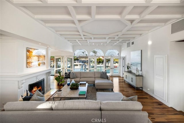 218 Evening Star Ln, Newport Beach, CA 92660 - living room featuring coffered ceiling, wood finished floors, a high end fireplace, a towering ceiling, and beam ceiling