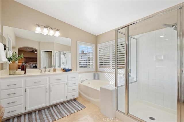 24261 Ernest Johnson Cir, Yorba Linda, CA 92887 - bathroom featuring vanity, a bath, a shower stall, connected bathroom, and tile patterned flooring