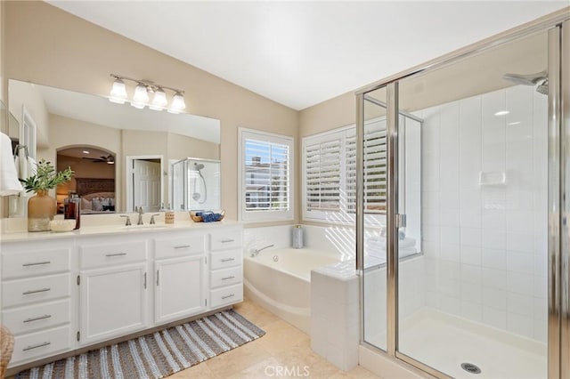24261 Ernest Johnson Cir, Yorba Linda, CA 92887 - full bathroom with vanity, a stall shower, a garden tub, ensuite bath, and tile patterned floors