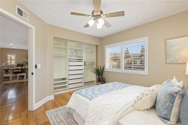 24261 Ernest Johnson Cir, Yorba Linda, CA 92887 - bedroom featuring wood finished floors, a closet, ceiling fan, and recessed lighting