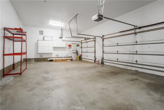 12160 Glines Ct, Tustin, CA 92782 - garage featuring a garage door opener