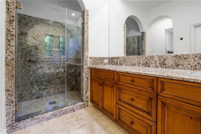 12160 Glines Ct, Tustin, CA 92782 - full bathroom with double vanity, a stall shower, recessed lighting, and tile patterned flooring