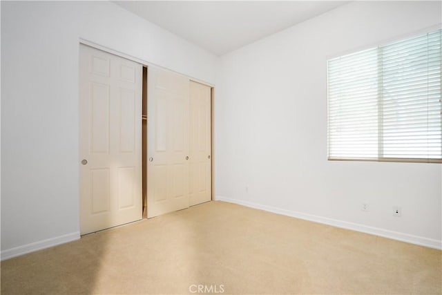 12160 Glines Ct, Tustin, CA 92782 - unfurnished bedroom with light carpet and a closet