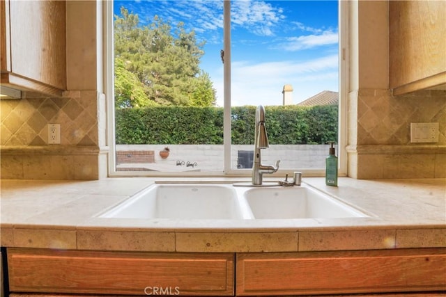 12160 Glines Ct, Tustin, CA 92782 - kitchen featuring light countertops and decorative backsplash